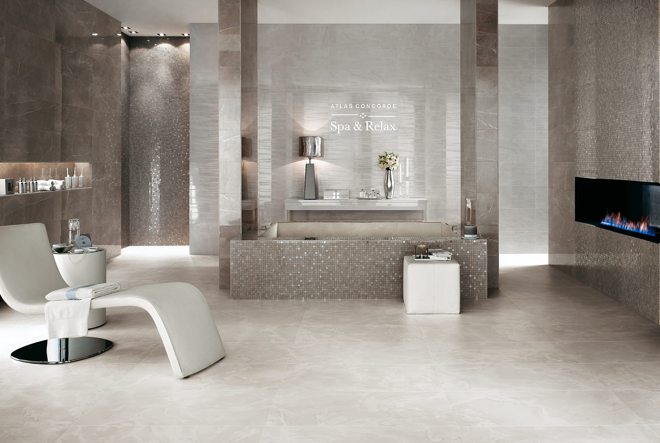 Сочетание холодных тонов Marvel Wall Design Silver Dream и Moon Onyx изысканно обогащает велнес-пространство: здесь естественная красота ценнейшего мрамора эффектно отражается в бесчисленных деталях. Матовые напольные плитки большого формата подчёркивают роскошный дизайн пространства, обеспечивая вместе с тем высочайшие эксплуатационные показатели.